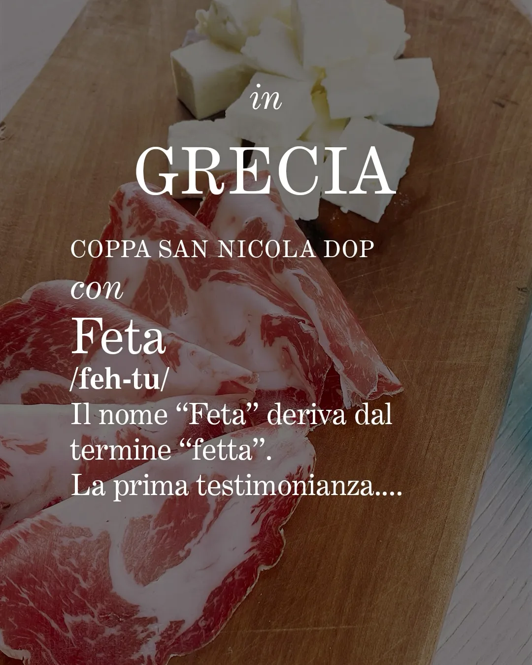 Coppa Piacentina e feta su tagliere di legno.
